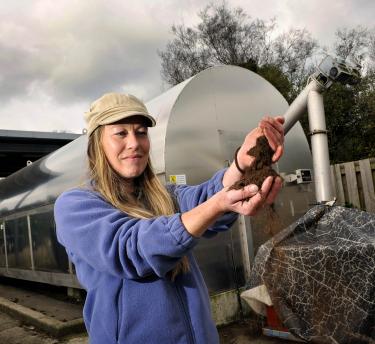 Woman and composter